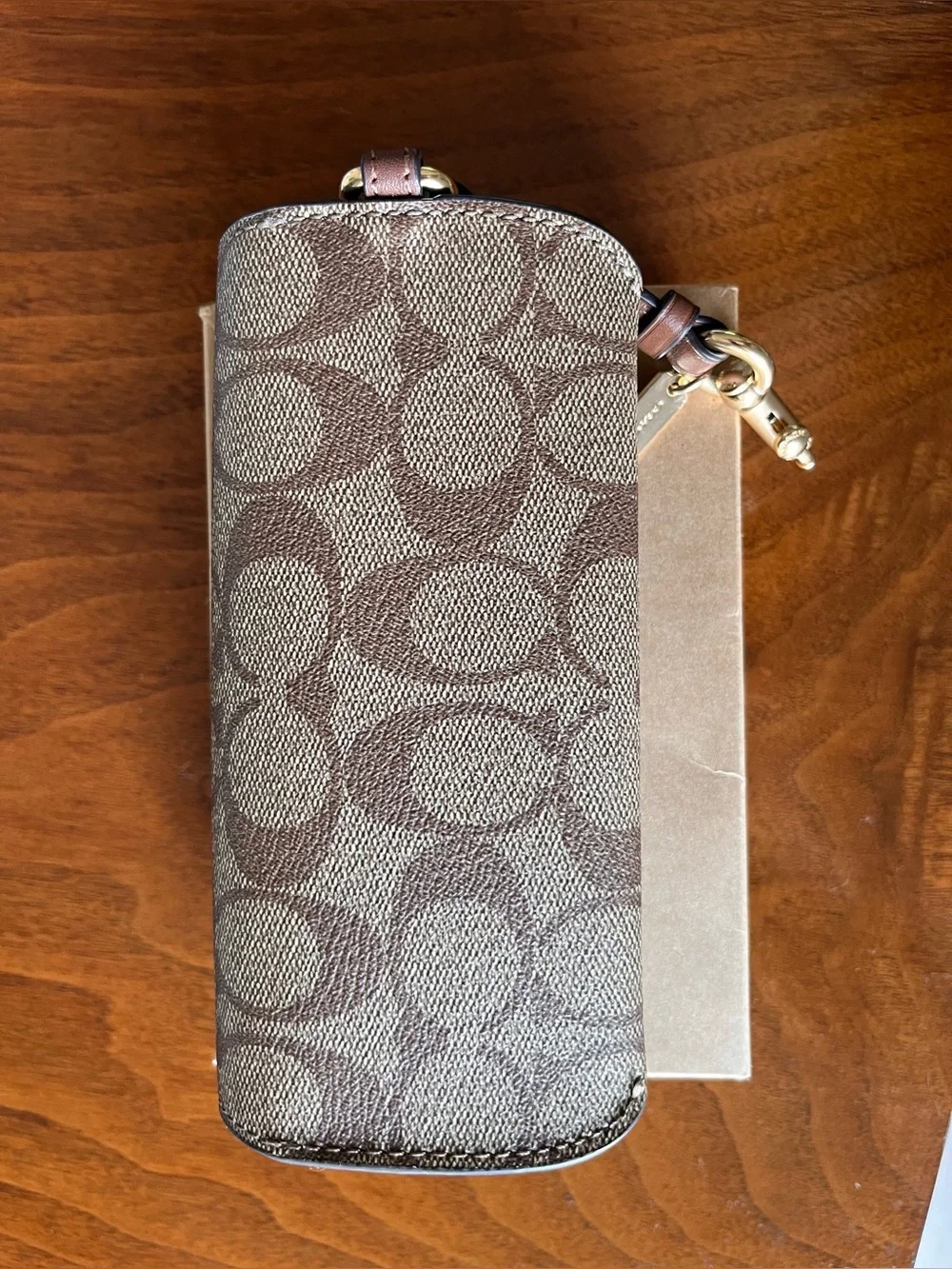 Coach glasses pouch in Signature khaki/tan! Clip on your bag or belt loop!
